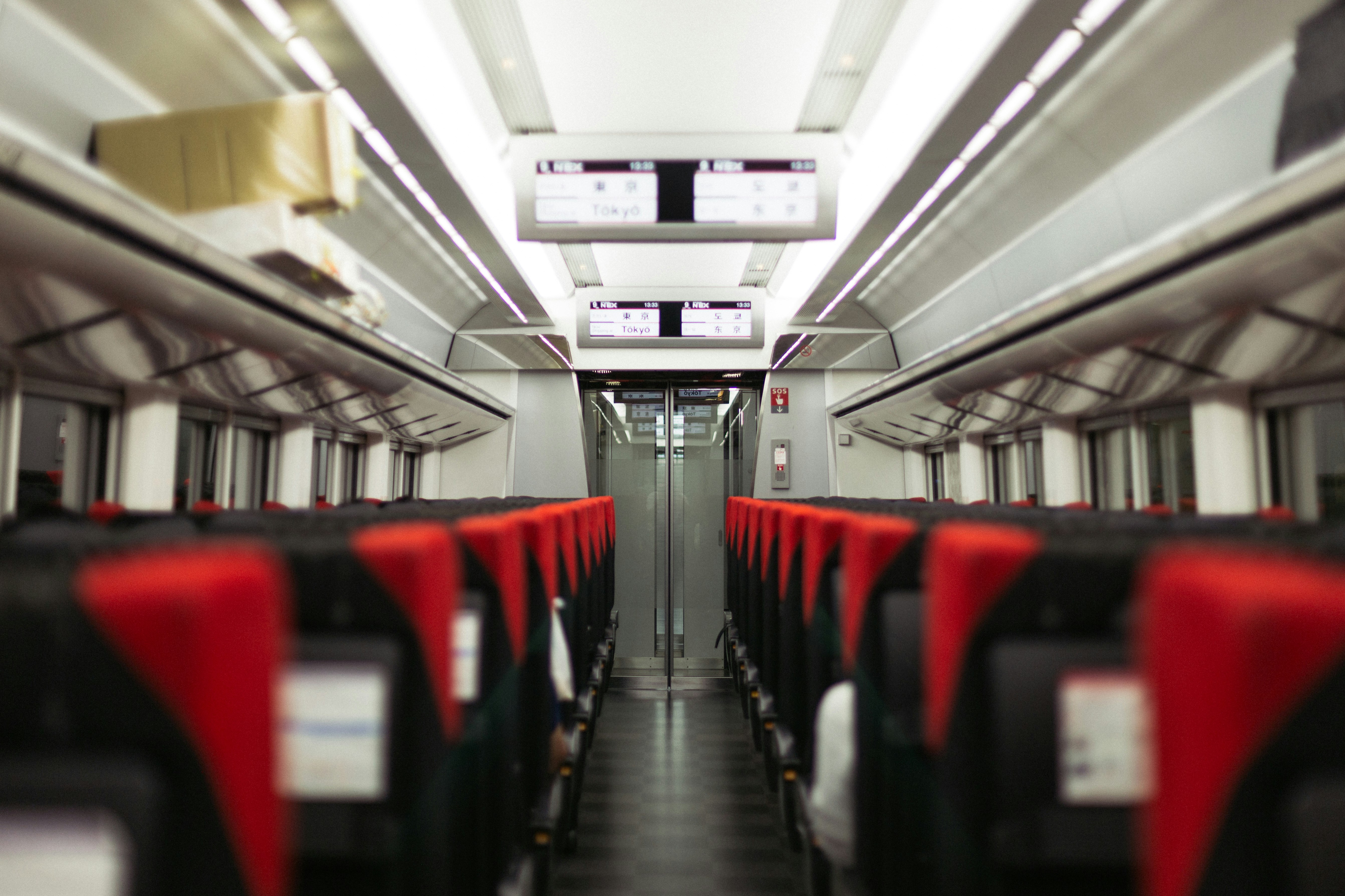 red and black train seats